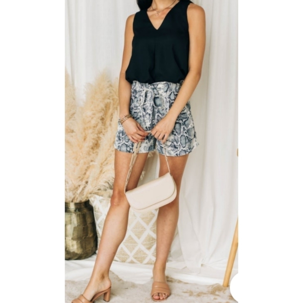 Space 46 snake print shorts